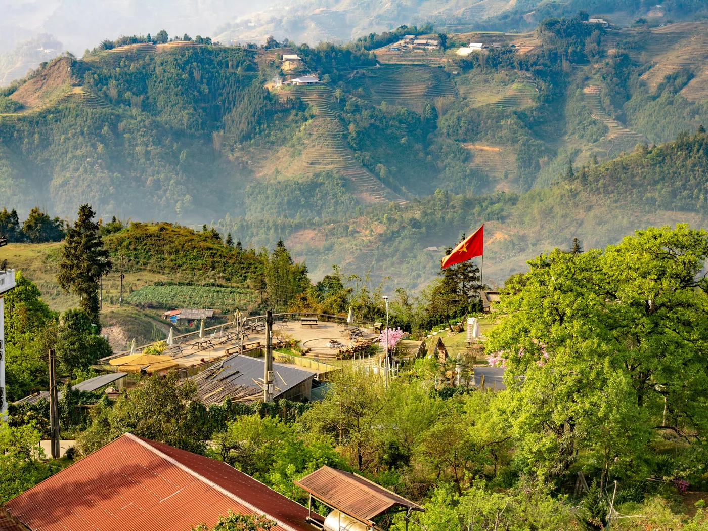 Terraced rice fields stepping down the mountainside in the Muong Hoa valley